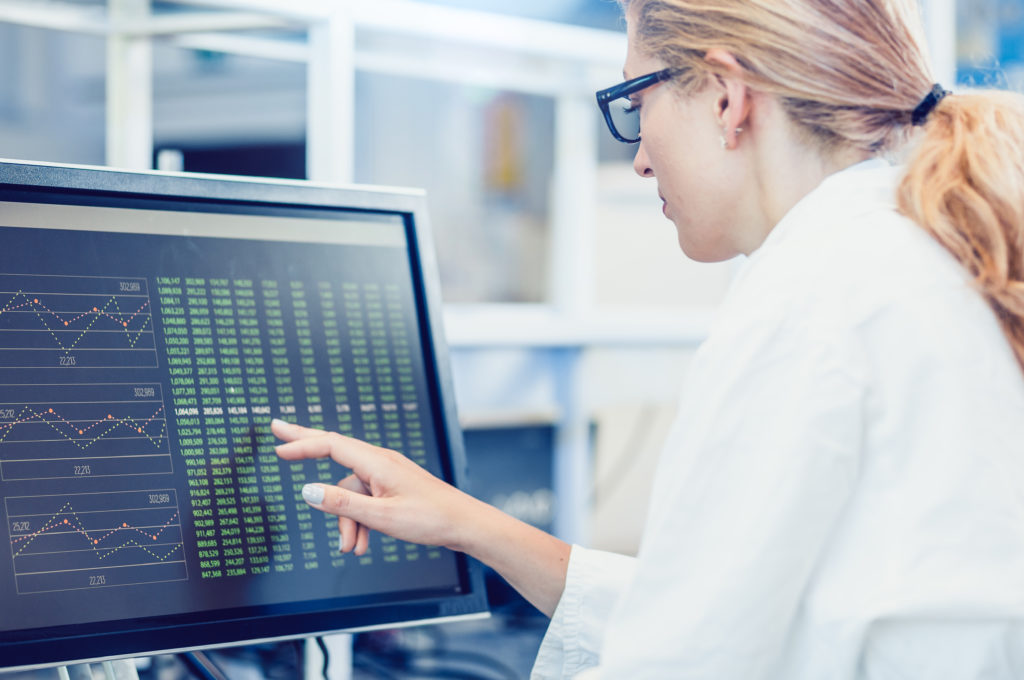 Scientist looking at data on computer